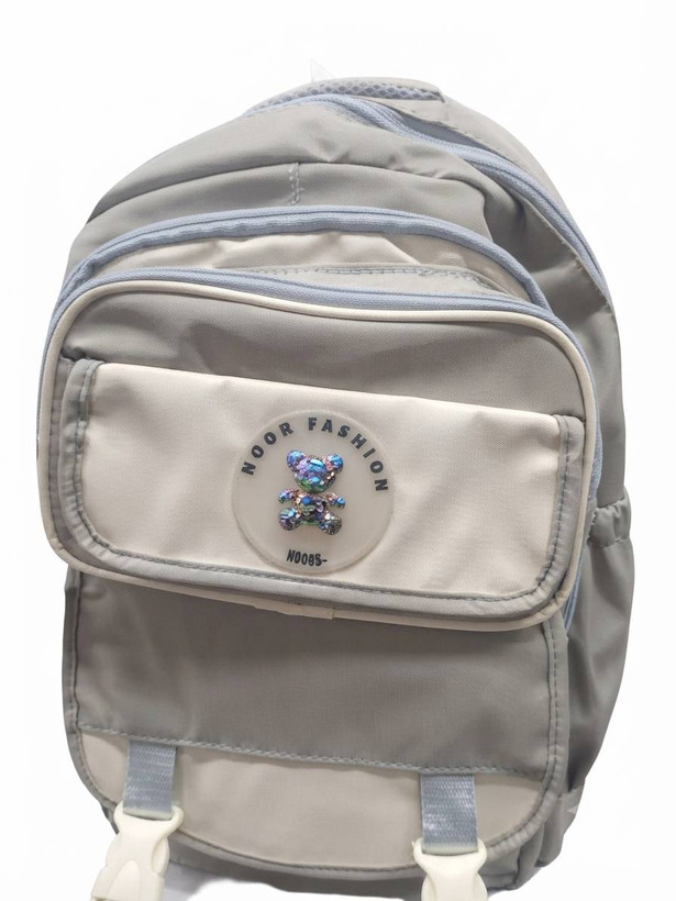 کوله پشتی فانتزی دخترانه طوسی کرمی با پلاک نگین دار خرس کریستالی هفت رنگ
